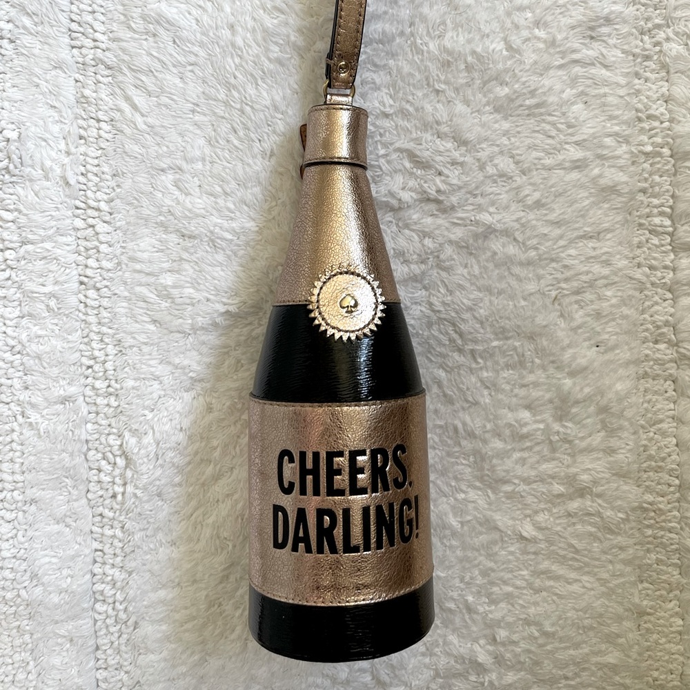 KATE SPADE NEW YORK “CHEERS, DARLING!” CHAMPAGNE BOTTLE WRISTLET PURSE